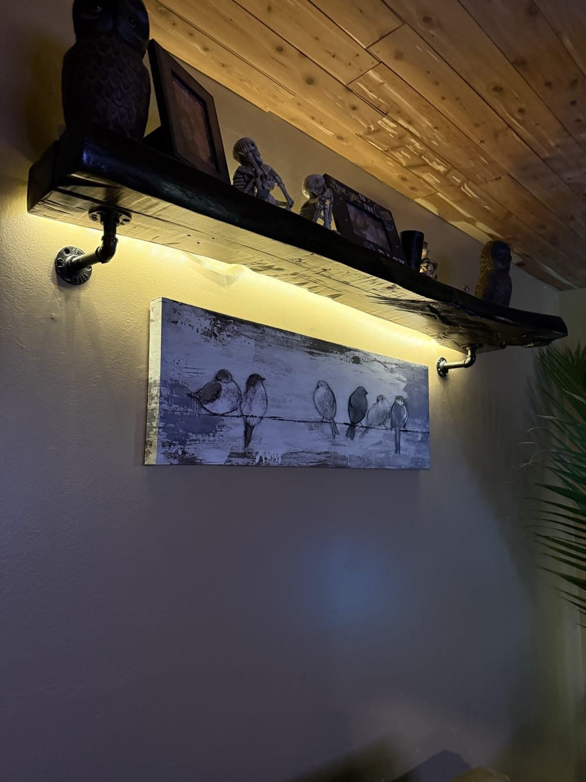 Custom floating shelf with LED tape lighting designed and wired by Spark Medic