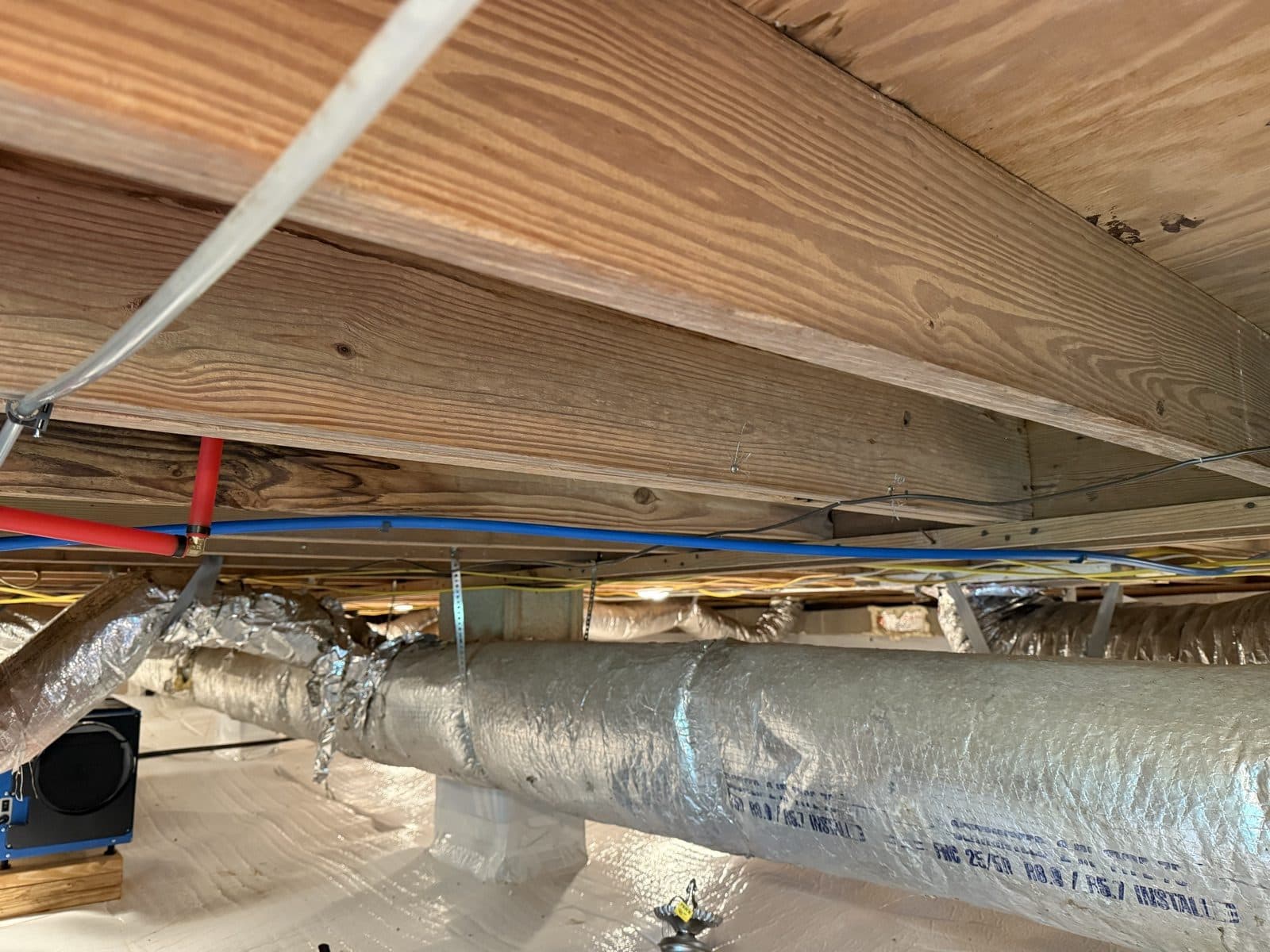 Encapsulated crawl space fully lit with lighting installed by Spark Medic